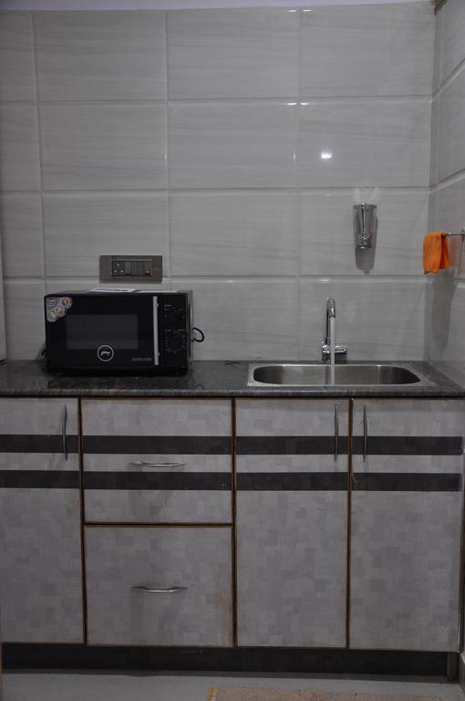 Hotel Av Comforts Bangalore Room photo